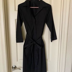 Theory size small mid length black dress.